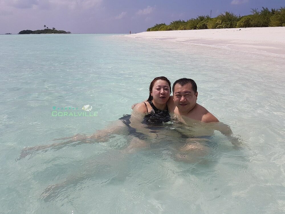 Фото Rasdhoo Coralville Hotel