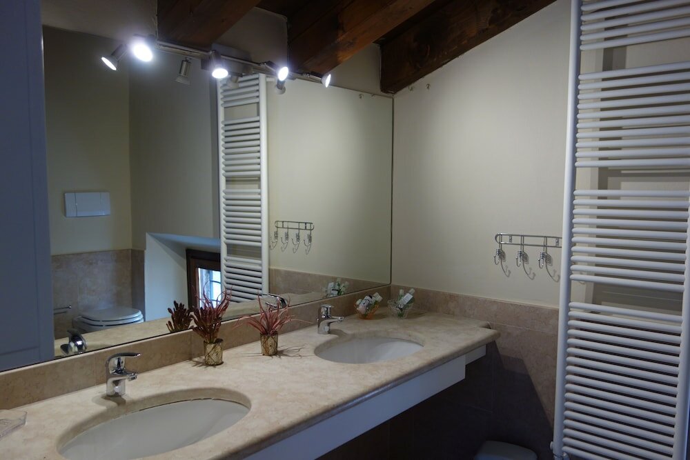 Фото Corte San Luca Apartments