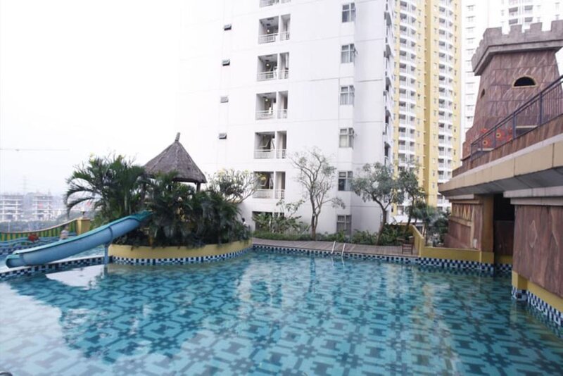 Гостиница Cozy and Relaxing 2br Great Western Resort Apartment в Тангеранге