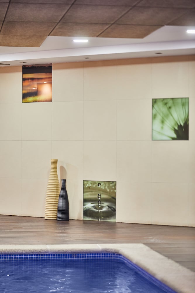 Фото Hotel Silken Ciudad Gijon