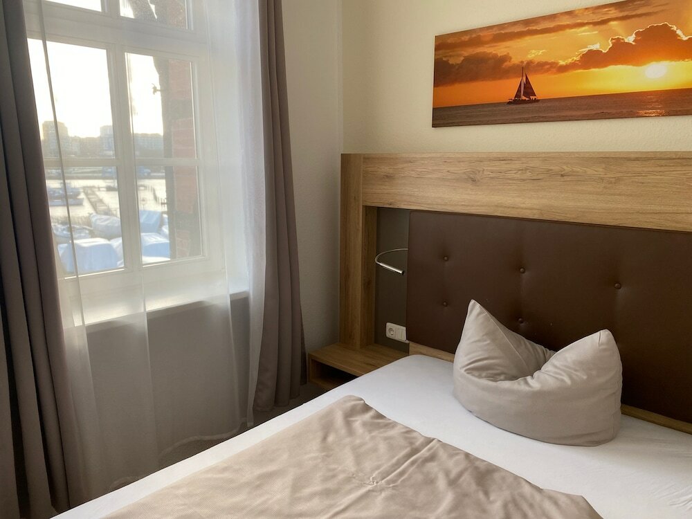 Фото Hotel Pension Zum Alten Fährhaus