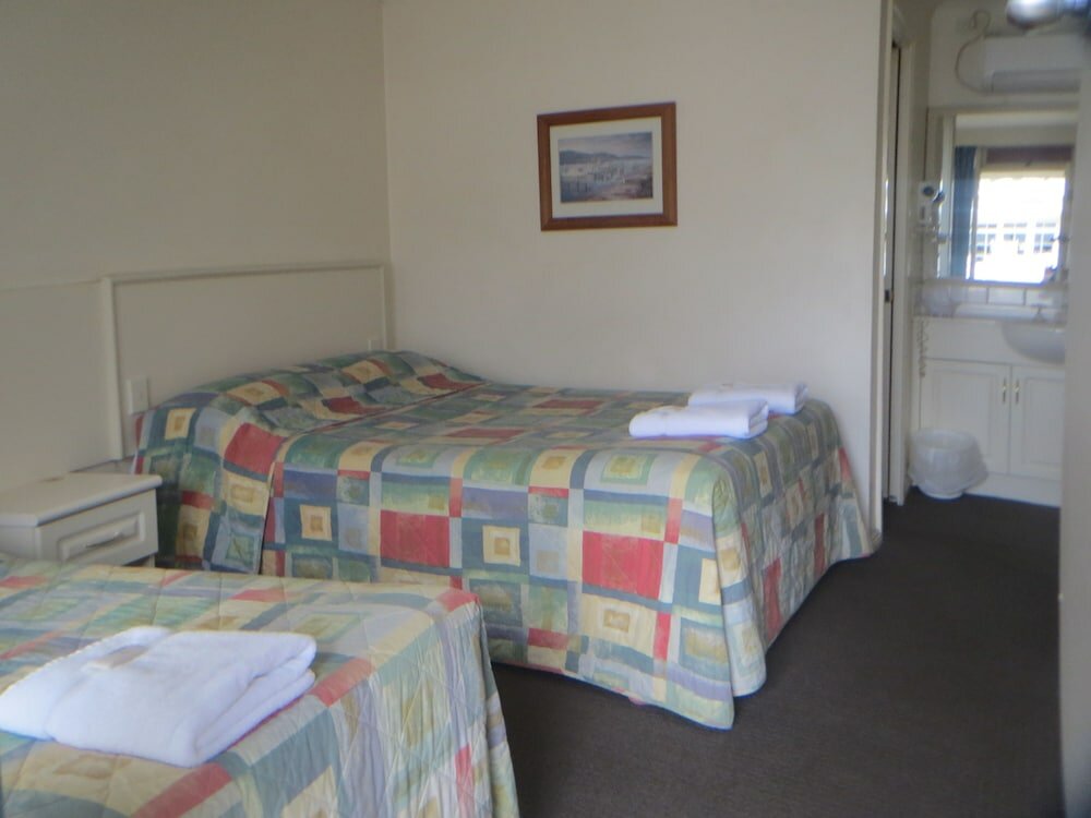 Фото Coachman Hotel Motel