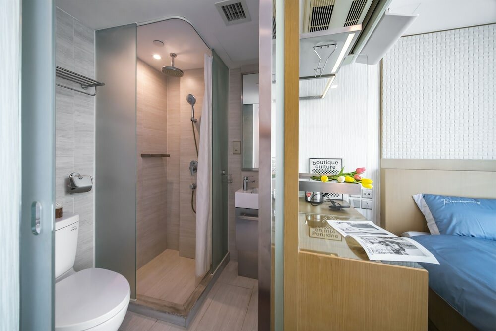 Фото Shingting Living Hotel Apartment