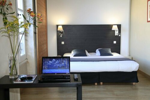 Гостиница Appart'hôtel Odalys Le Cheval Blanc в Ниме