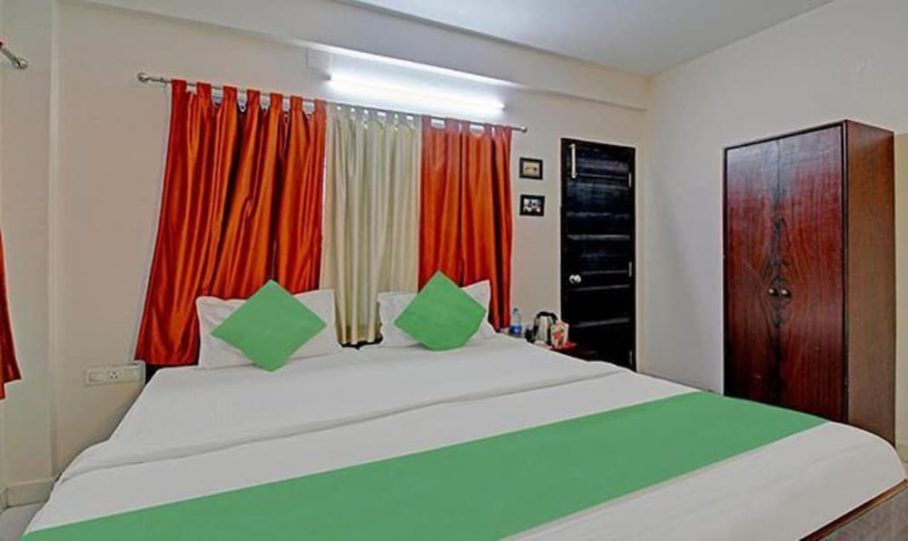 Фото Fabhotel Ashraya Inn