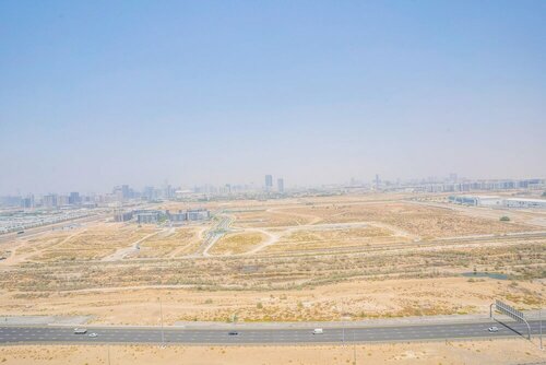 Апартаменты Tanin - Sleek Studio Offering Unobstructed City Views в Дубае