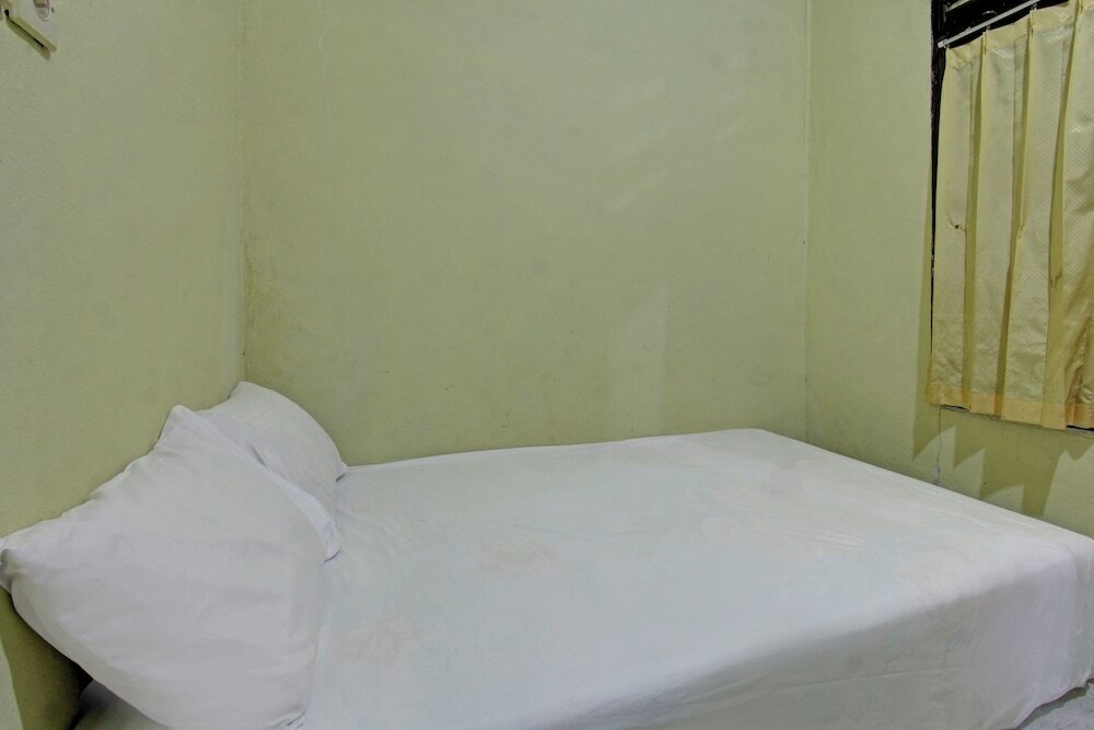 Фото Spot On 92882 Penginapan 3 Bersaudara