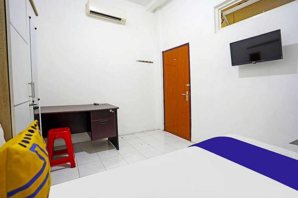 Фото Spot On 91360 Swk 68 Syariah