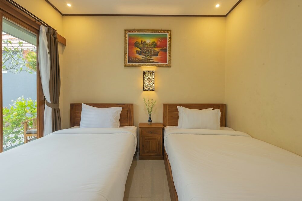 Фото Liliy Guest House Legian