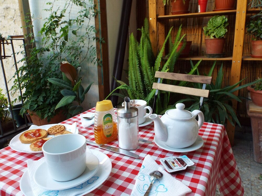 Фото B&b In giro per Napoli