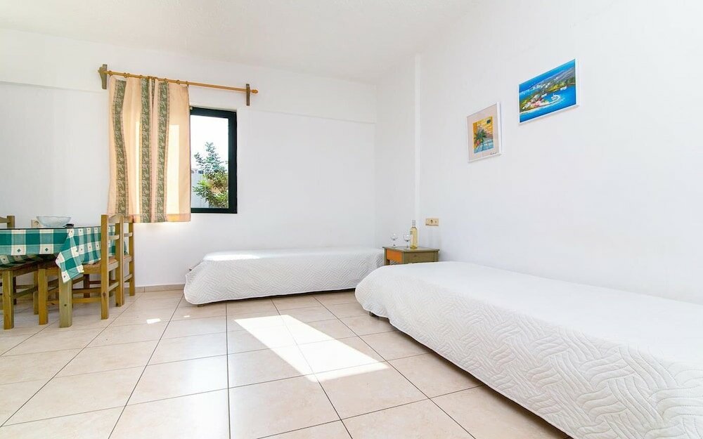 Фото Dionysos Apartments & Studios