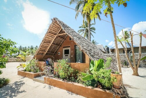 Гостиница Yellow Card Apartment & Bungalow в Танзании