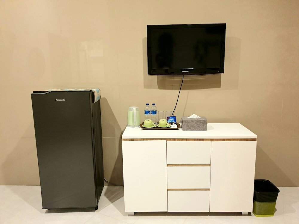 Фото Comfy Room in Piliau Residence