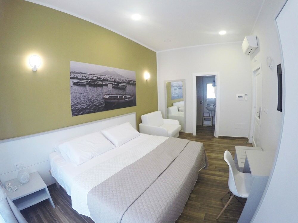 Фото Rooms Stazione Centrale