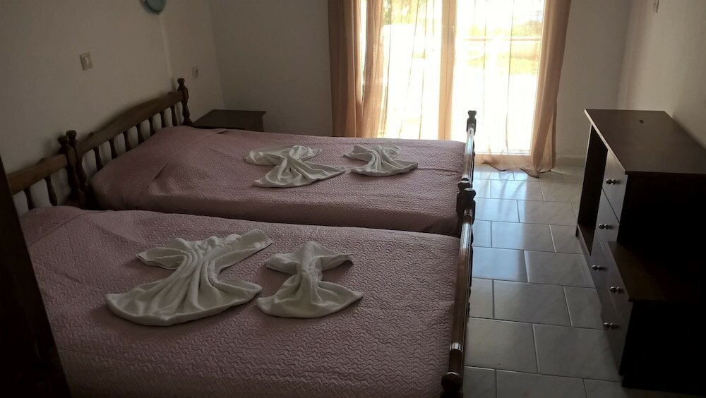 Фото Kyparissis Rooms