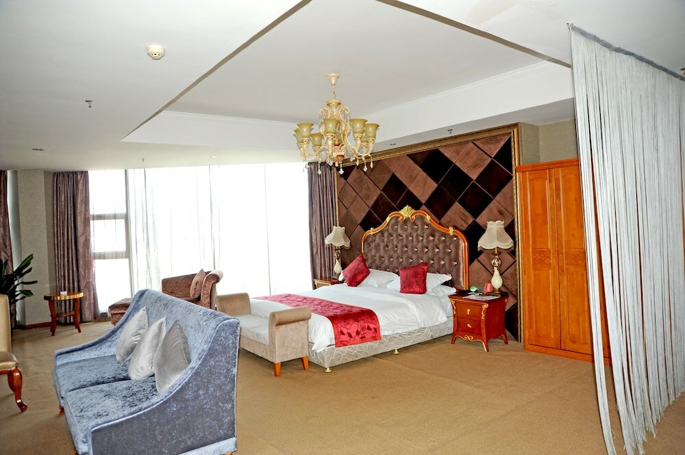 Фото Dinis Business Hotel Kaiyuan Branch