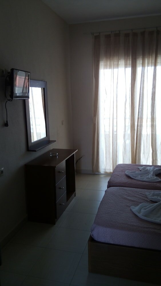 Фото Kyparissis Rooms