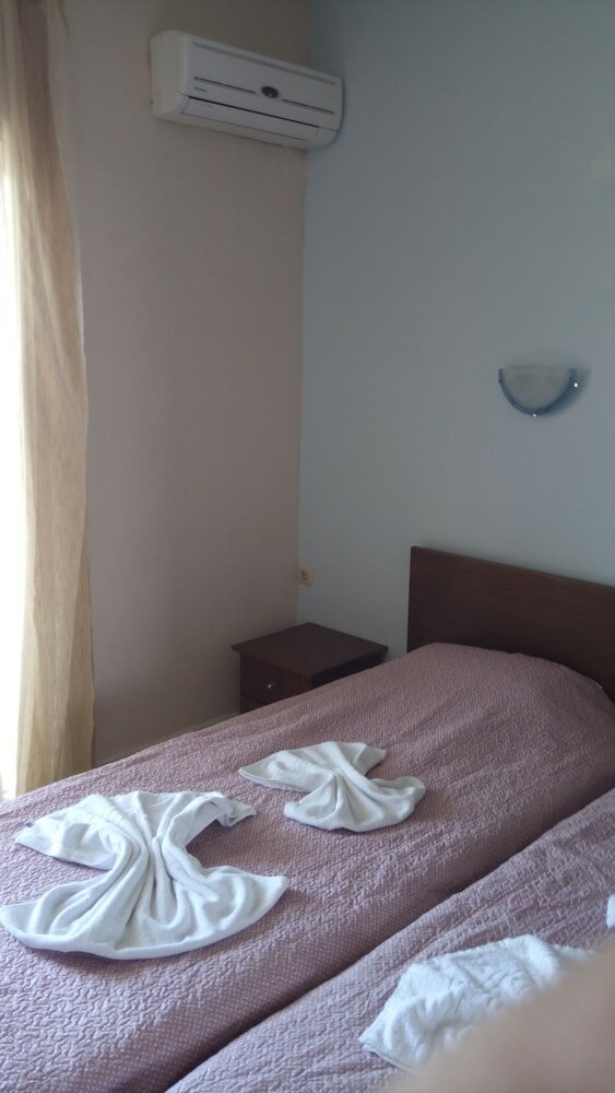 Фото Kyparissis Rooms