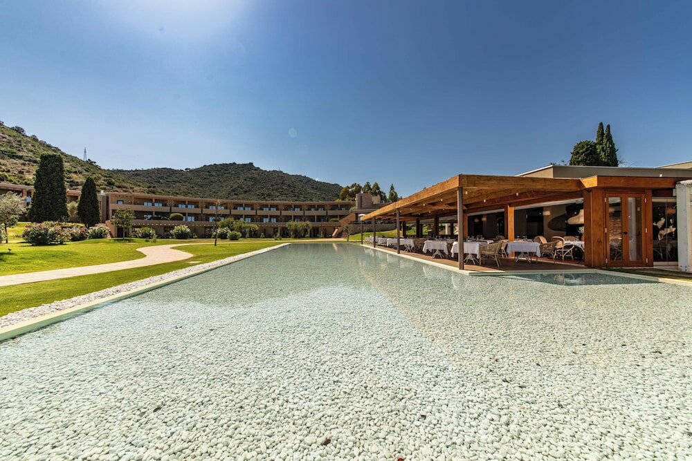 Фото Курортный отель Is Molas Resort