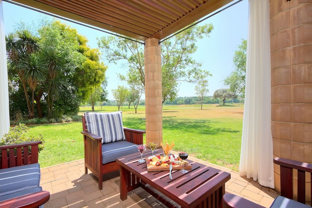 Фото Centurion Golf Suites Boca Walk