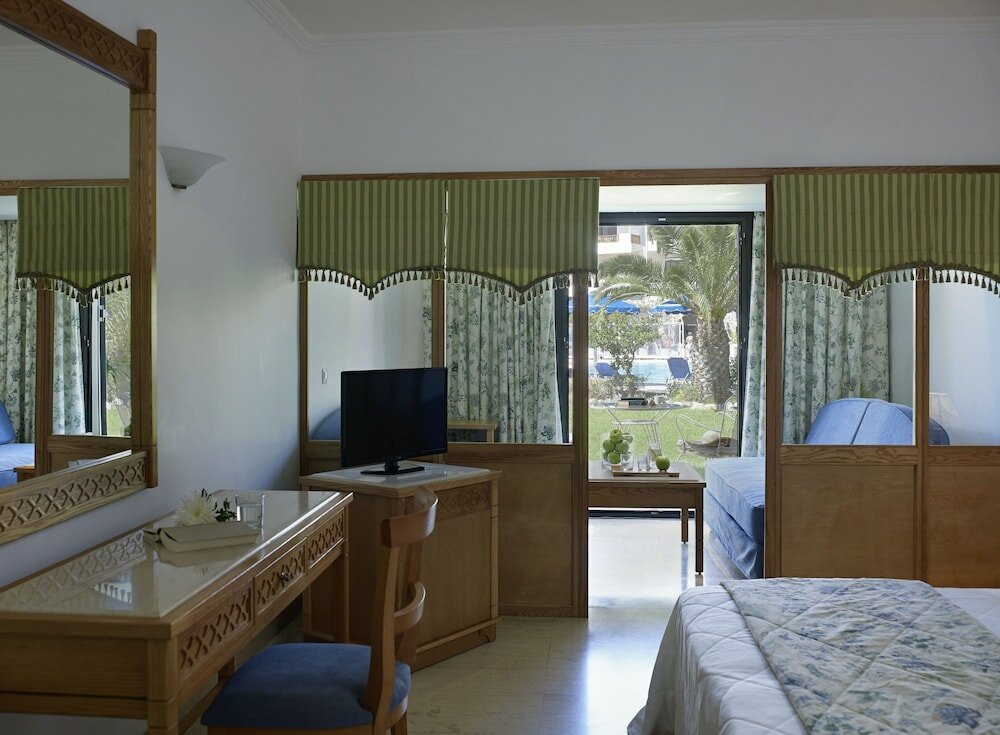 Фото Mitsis Ramira Beach Hotel - All Inclusive