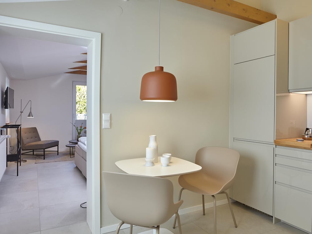 Фото Ferienhaus & Appartments Düneneck 8