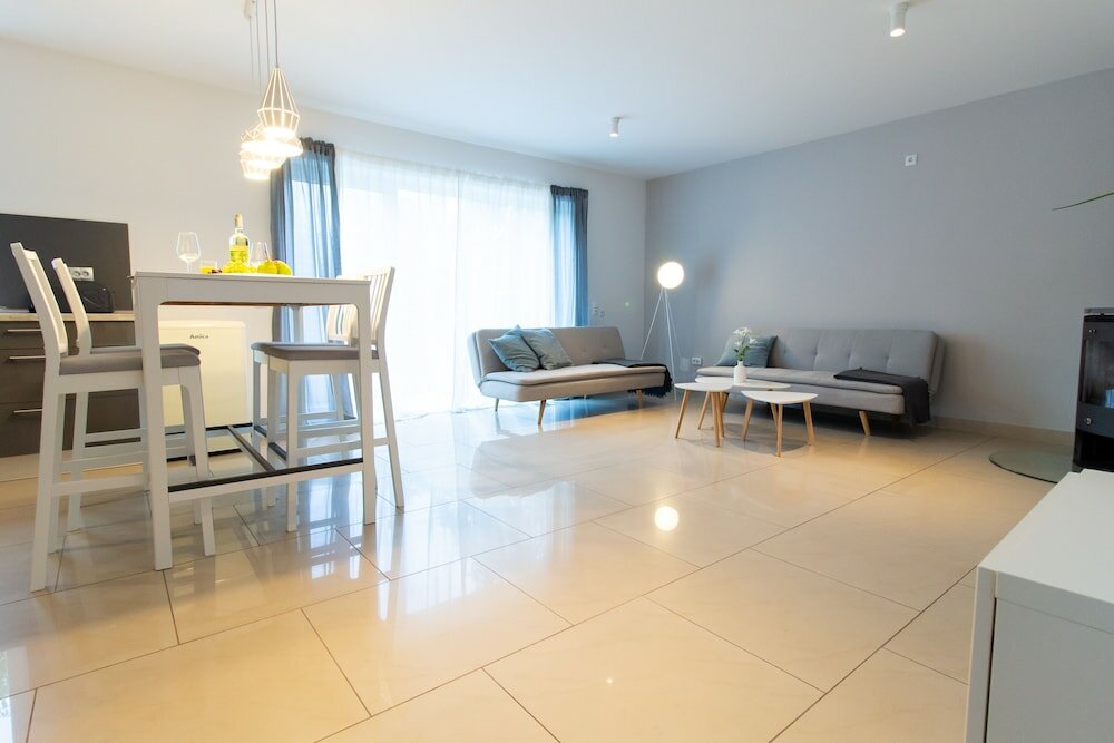 Фото T & T Suites Raunheim