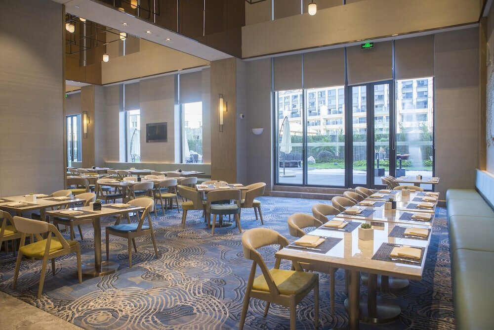 Фото The Qube Hotel Shanghai Sanjiagang