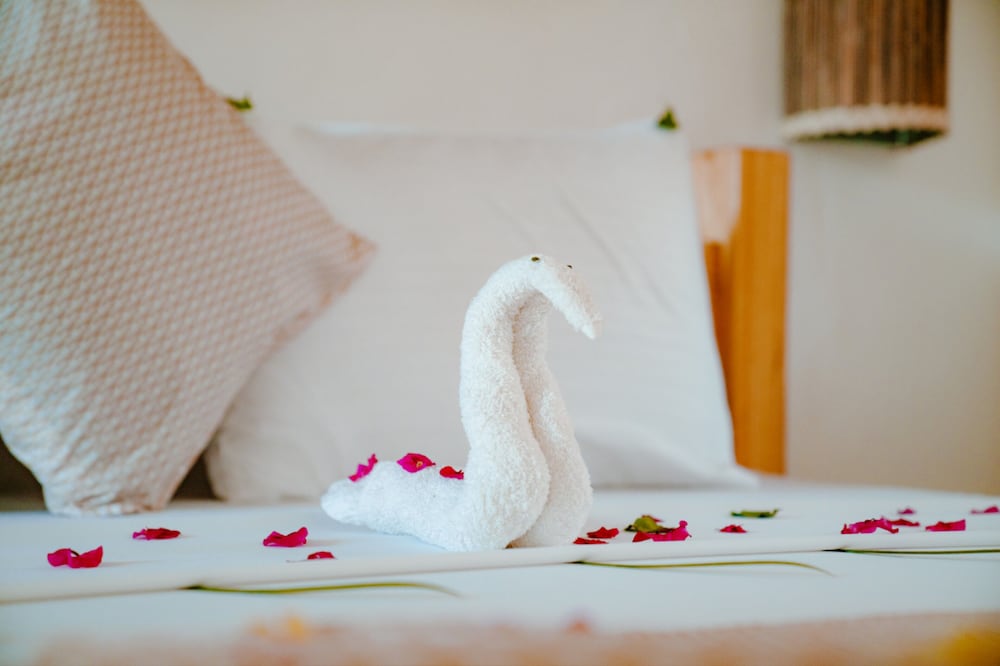 Фото Tiki Beach Club and Resort