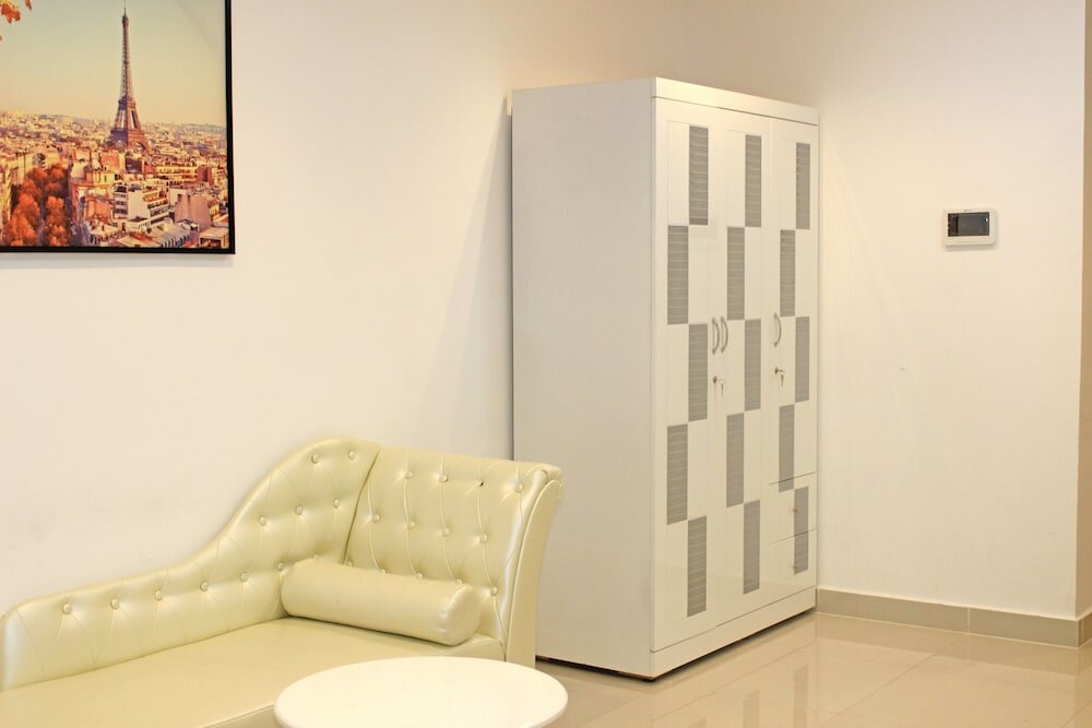 Фото Oyo 103 Airport Family Apartment