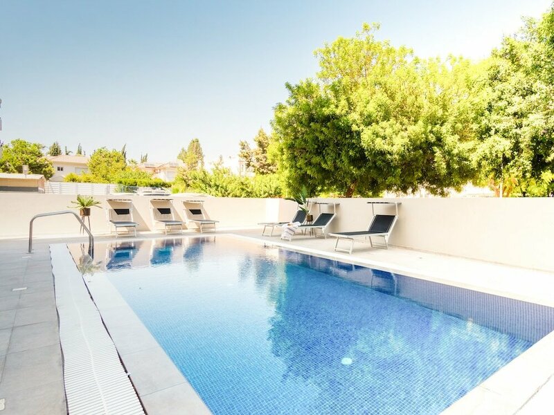 Гостиница Sanders Evolution - Snug 3-bdr Apt w Shared Pool в Лимассоле