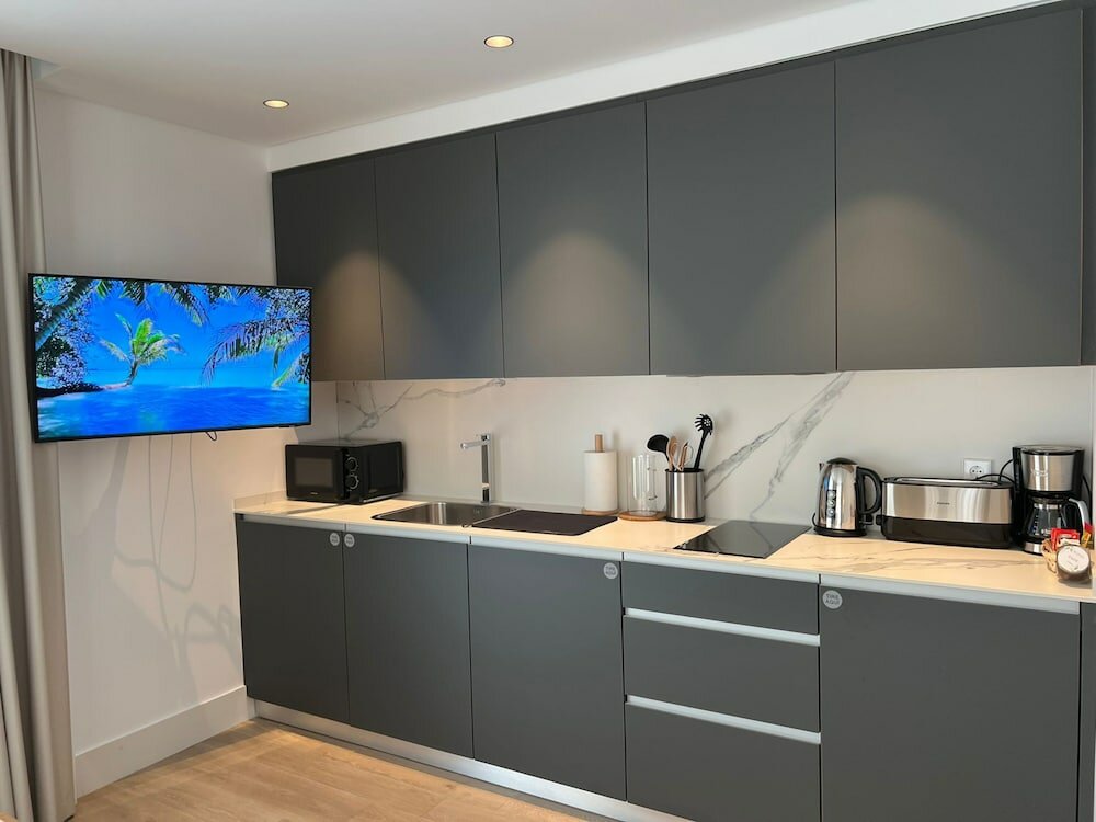 Фото Apartamentos Turísticos La Plaza