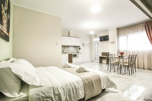 Гостиница Del Sol Meteora Luxurious Family Suites1 в Каламбаке
