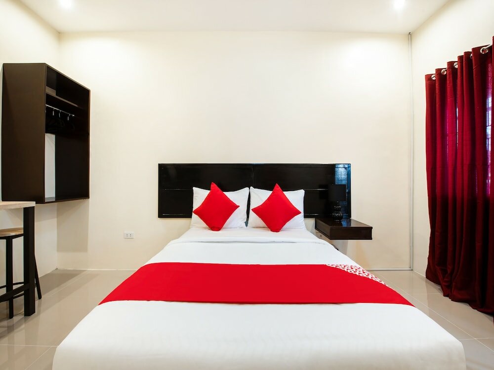 Фото Oyo 490 V-cat Apartelle