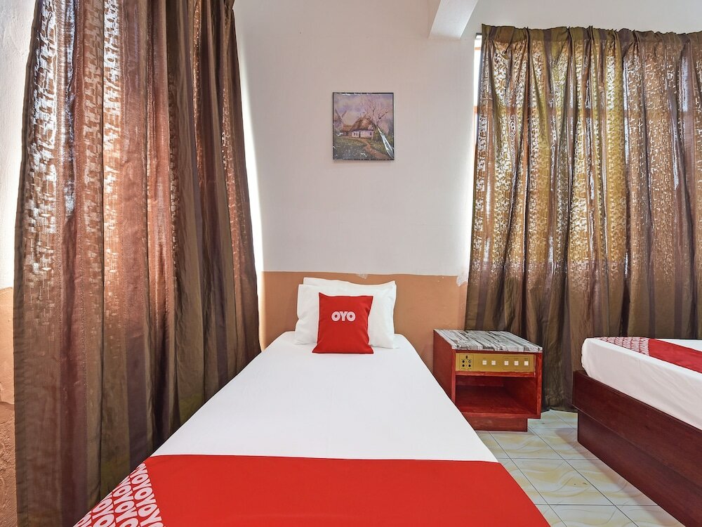 Фото Super Oyo Capital O 90659 Raintown Timbers Hotel