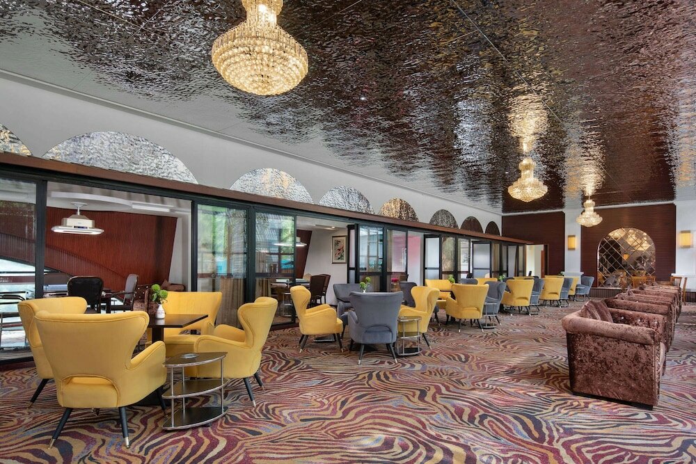 Фото Wyndham Garden Chengdu Huashuiwan