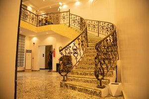 Гостиница Entrust Hotel and Suites