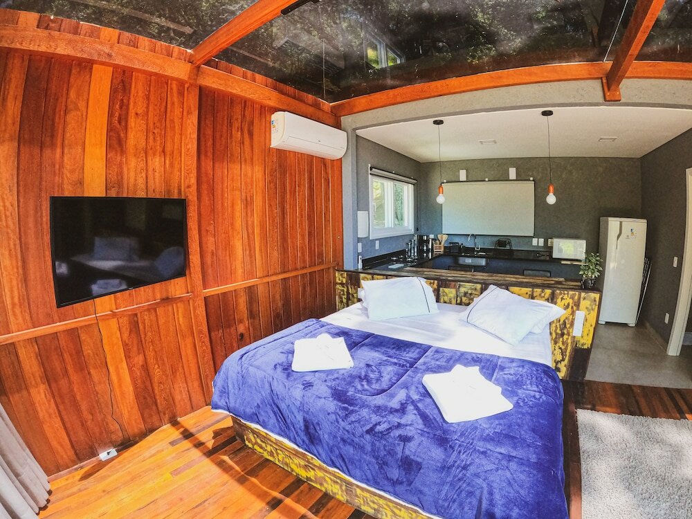 Фото Casa de Vidro - Hospedar com Propósito