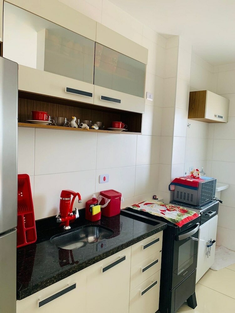 Фото Lindo apto com piscina em Praia Grande