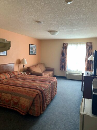 Гостиница Aurora Park Inn & Suites в Досон-Крик