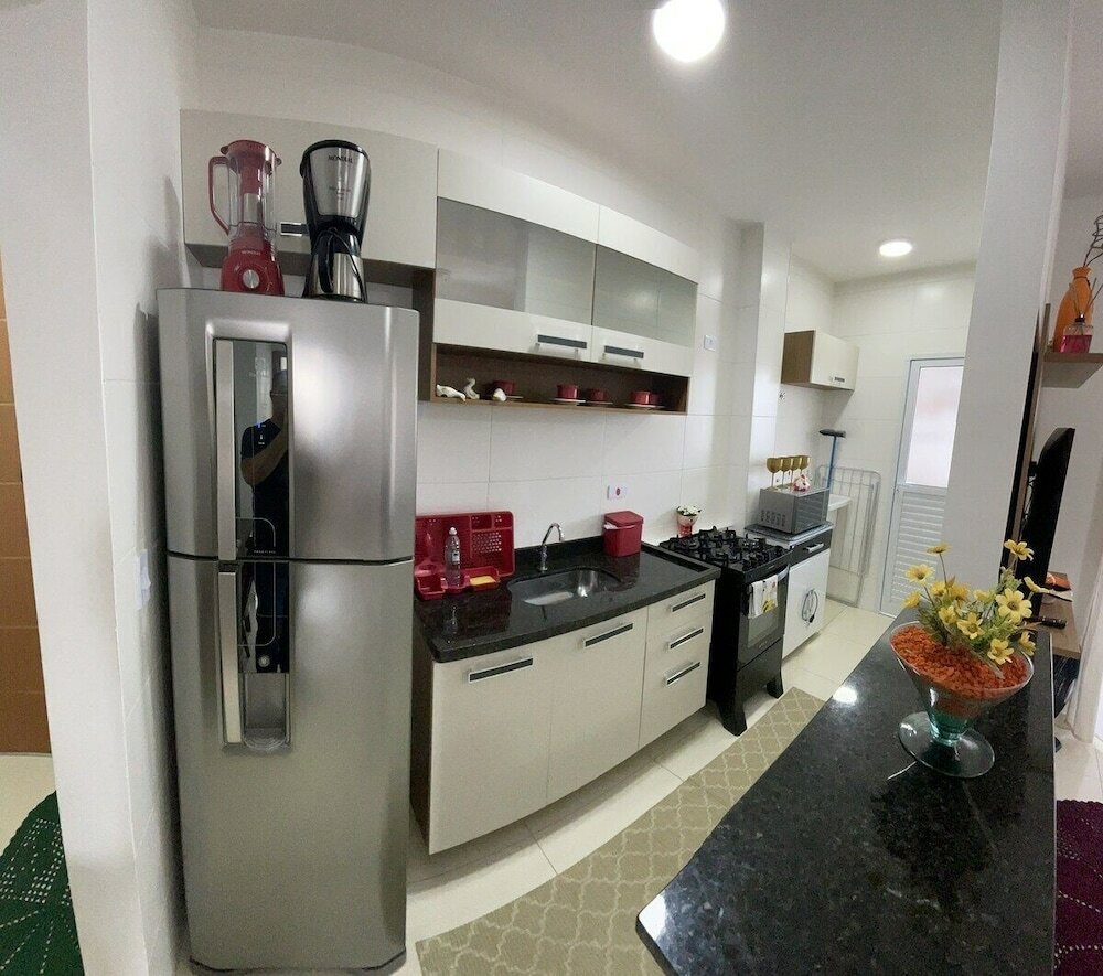 Фото Lindo apto com piscina em Praia Grande