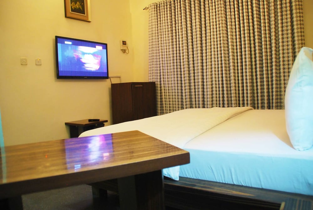 Фото Tuscany Suites