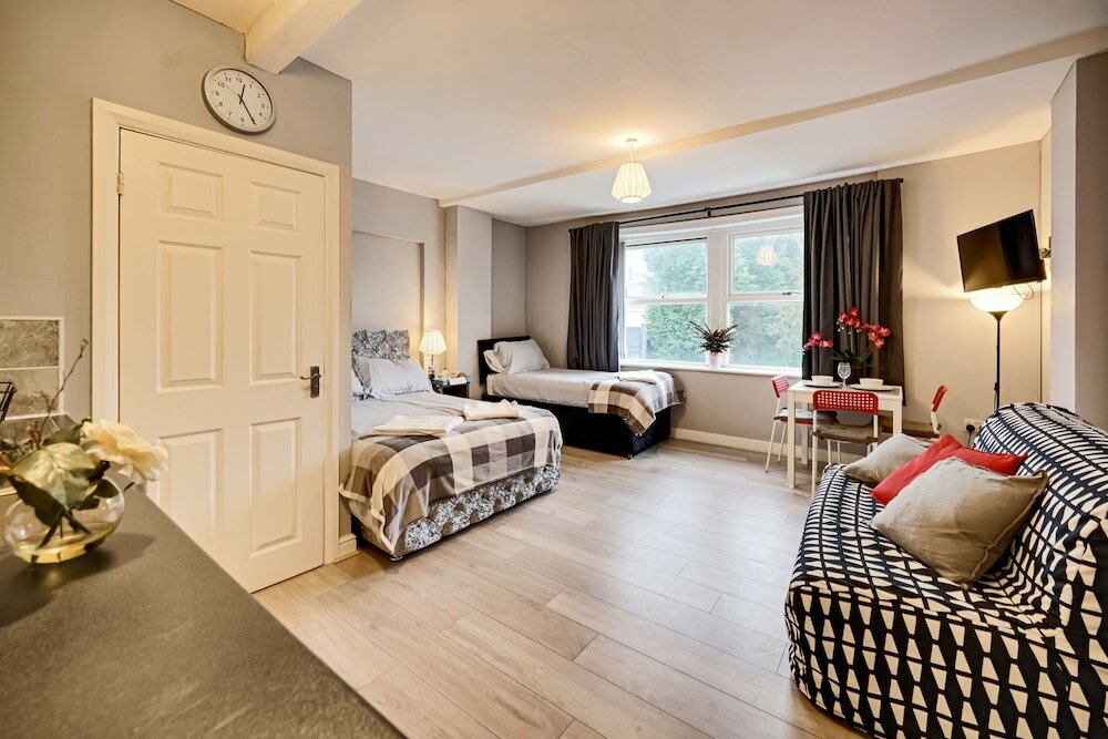 Фото Grey Stone Studio Apartments