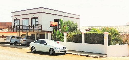Гостиница Room for 6 - Amarachi Guesthouse in Swakopmund Namibia Near Beach and Malls в Свакопмунде