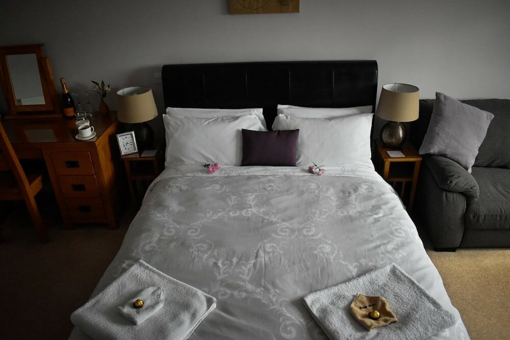 Фото Tlc Exmouth Bed and Breakfast