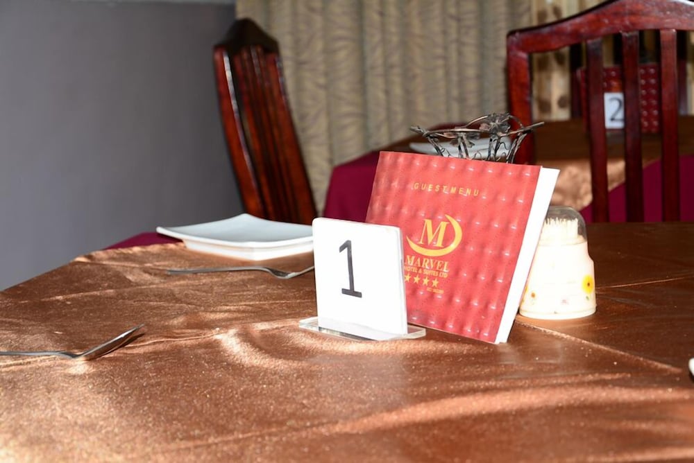 Фото Marvel Hotel Suites