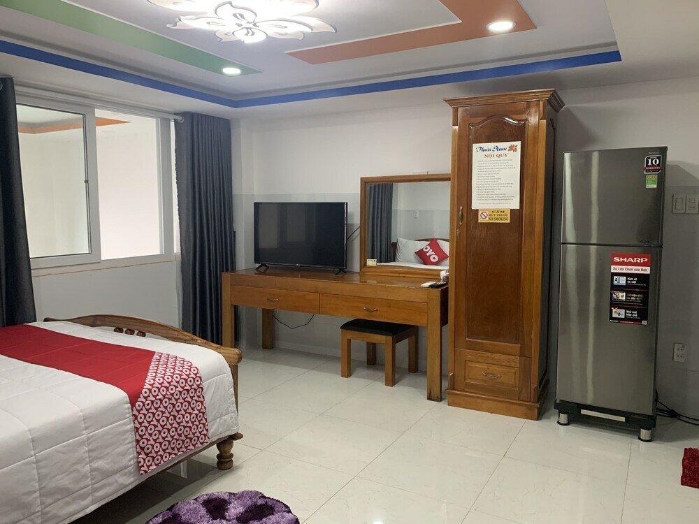 Фото Oyo 1028 Flower House Apartment