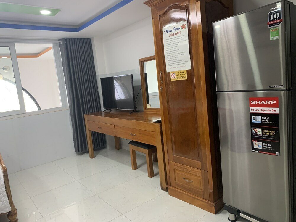 Фото Oyo 1028 Flower House Apartment