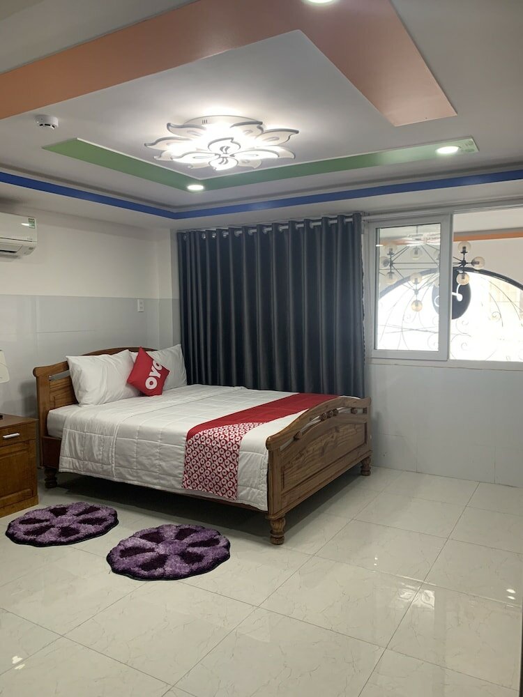 Фото Oyo 1028 Flower House Apartment