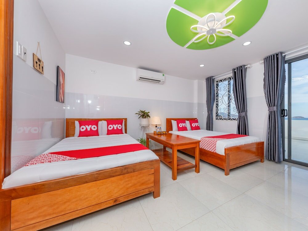 Фото Oyo 1028 Flower House Apartment